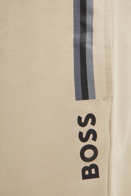 Bavlněné kalhoty BOSS béžová 50535813
