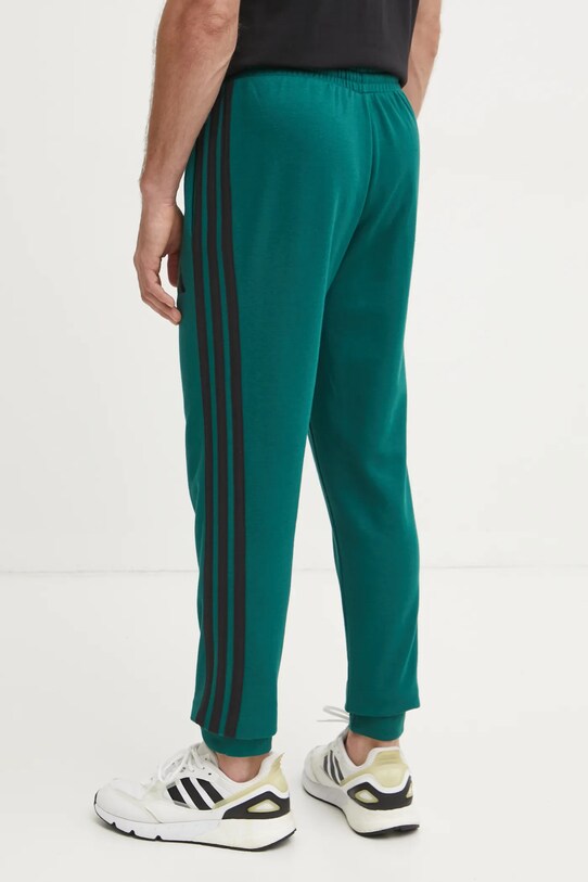 Oblečenie Tepláky adidas Essentials JD1879 zelená