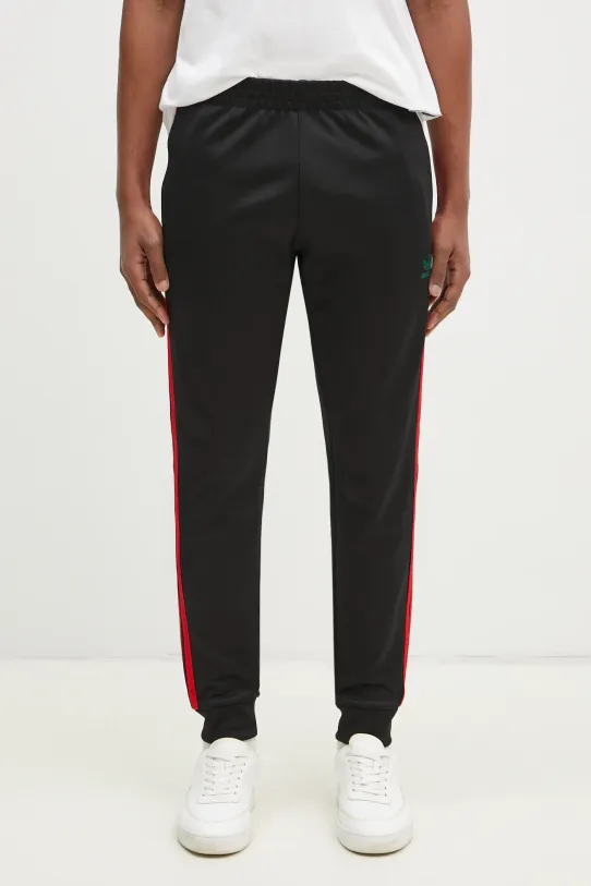 Спортен панталон adidas Originals SST TP щампа черен JP1225