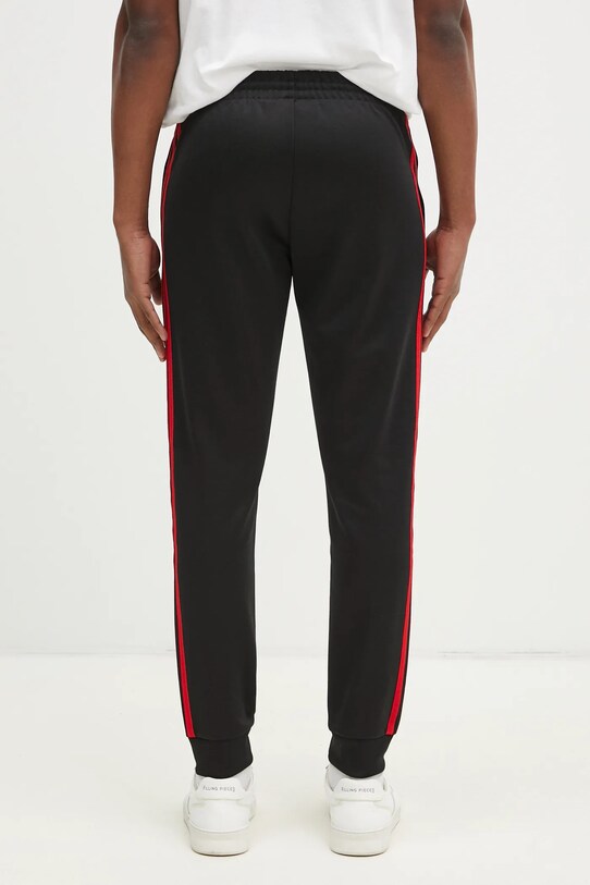 Ρούχα Παντελόνι φόρμας adidas Originals SST TP JP1225 μαύρο