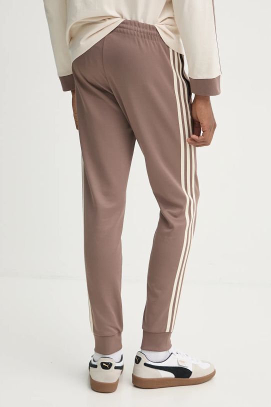 Oblečenie Tepláky adidas Originals SST TP JP2518 béžová