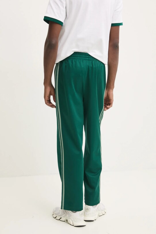 Одяг Спортивні штани adidas Originals Firebird JP1065 зелений