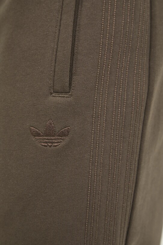 Одяг Бавовняні спортивні штани adidas Originals Essential JD3318 зелений