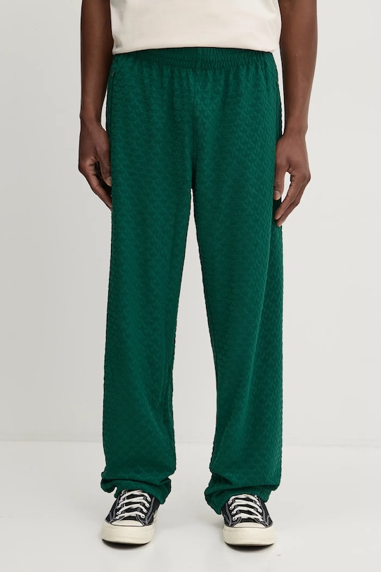 Donji dio trenirke adidas Originals Q12 MONOGRAM TR s elastinom zelena JD0699