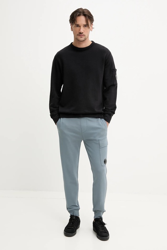 C.P. Company spodnie dresowe bawełniane 18CMSP017A005086W niebieski SS25