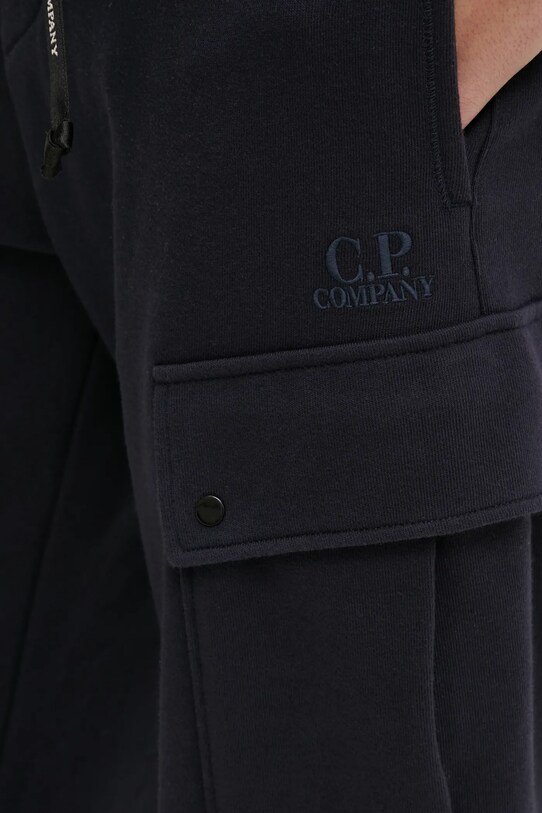 Bavlnené tepláky C.P. Company tmavomodrá 18CMSP045A005086W