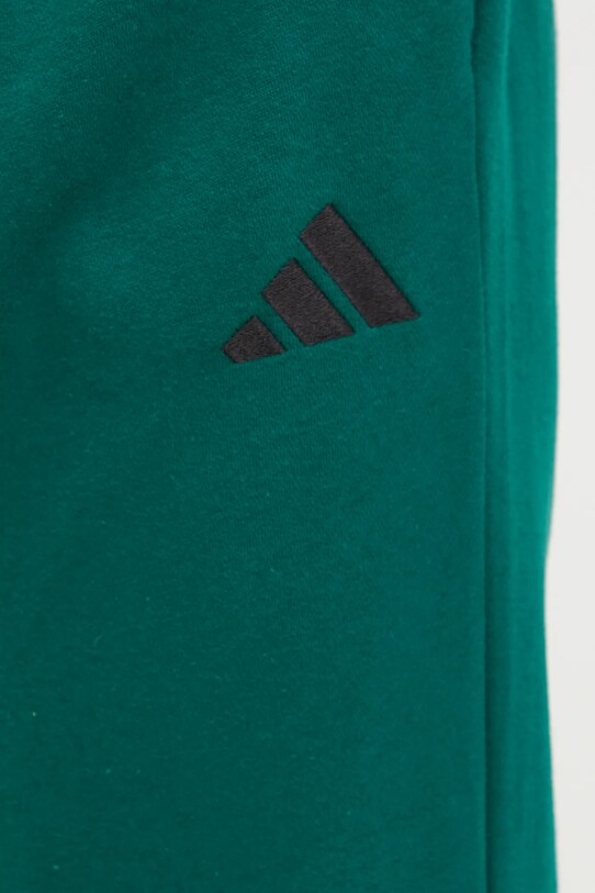 Спортивні штани adidas Feelcozy зелений IN6072