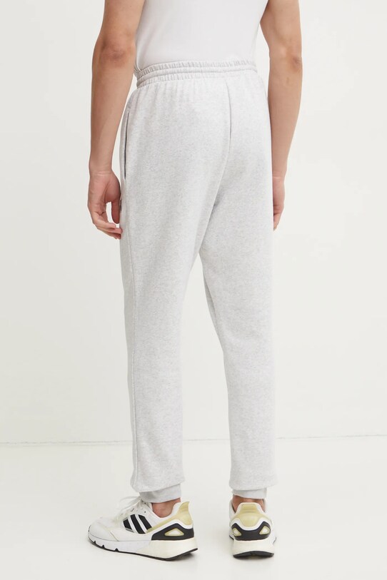 Odzież adidas spodnie dresowe Feelcozy JE3819 szary