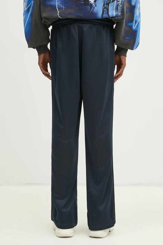 Oblačila Spodnji del trenirke adidas Originals Flare Pant JC8382 mornarsko modra