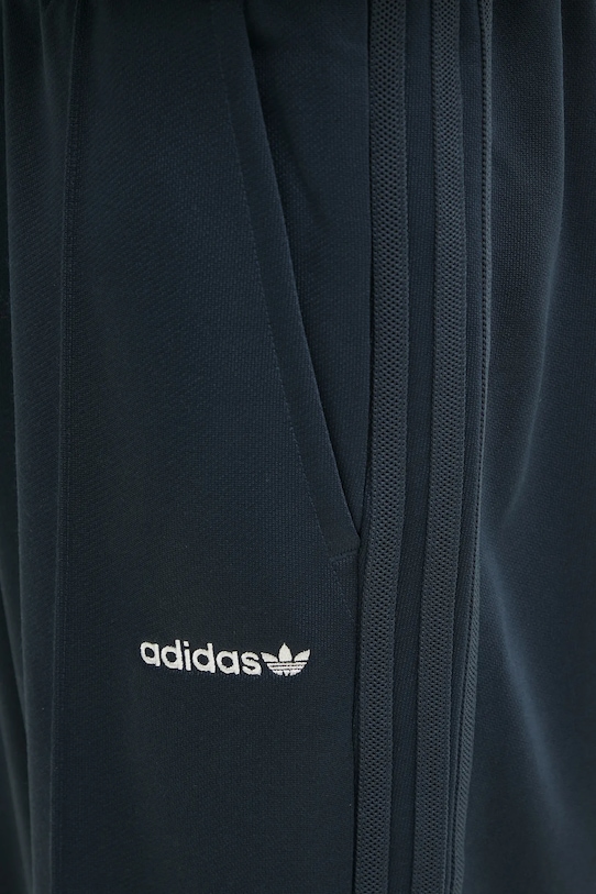 Spodnji del trenirke adidas Originals Flare Pant mornarsko modra JC8382