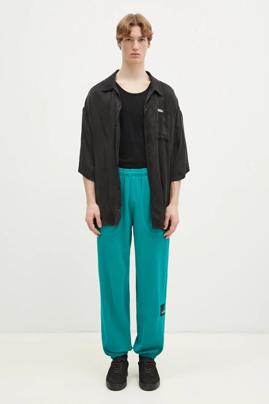 adidas Originals pantaloni della tuta Equipment Reflective Pant JP0356 turchese
