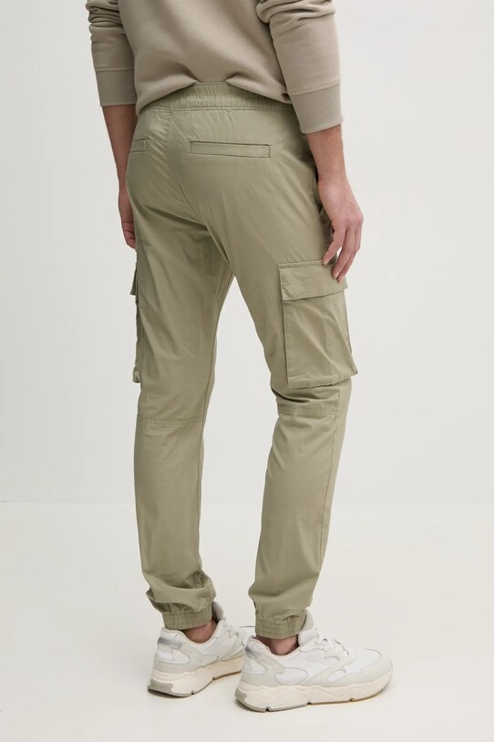 Одяг Штани Calvin Klein Jeans J30J327614 зелений
