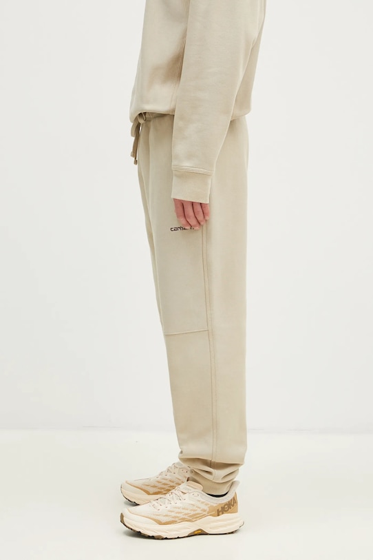 Παντελόνι φόρμας Carhartt WIP American Script Jogging Pant I027042.2LPXX μπεζ SS25