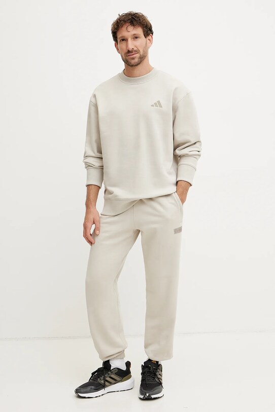Bavlněné tepláky adidas x Mercedes JW3083 béžová SS25