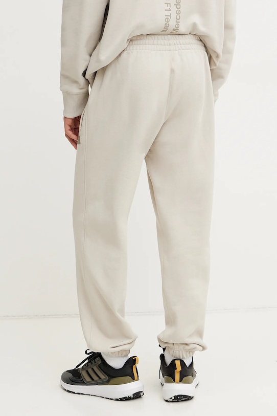 Îmbrăcăminte adidas pantaloni de trening din bumbac x Mercedes JW3083 bej