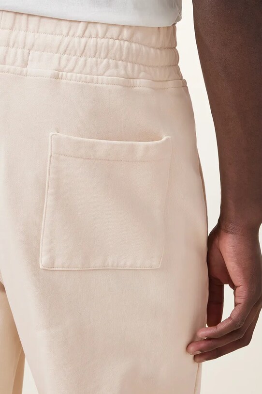 AllSaints spodnie dresowe bawełniane UNDRGRND beżowy M031TB