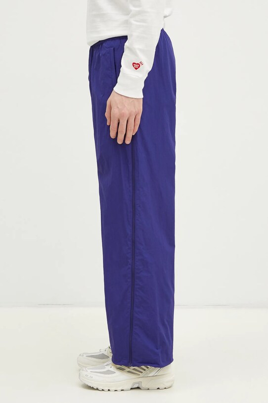 Одежда Спортивные штаны adidas Originals SST TRACKPANT JX1693 фиолетовой