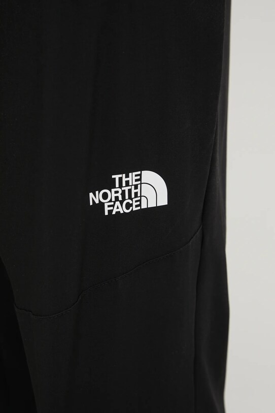 Sportovní kalhoty The North Face Mountain Athletics černá NF0A8BGNJK31