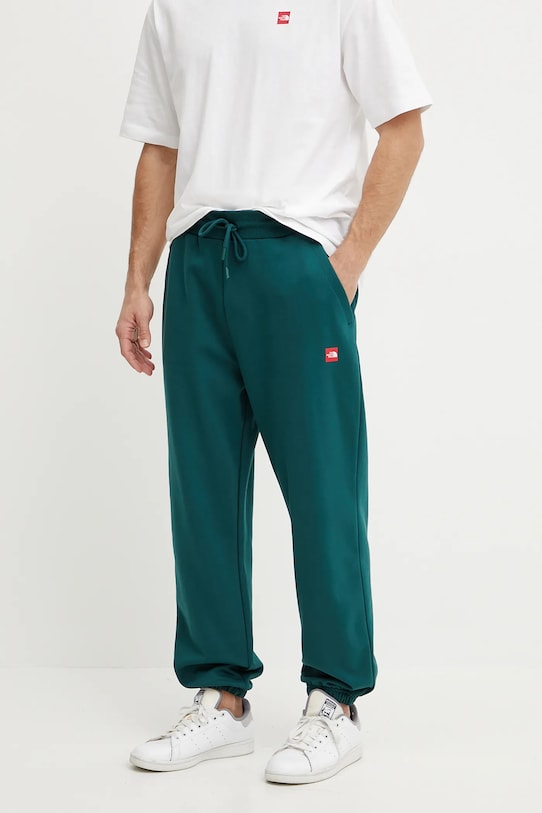 Bavlněné tepláky The North Face Axys pletenina zelená NF0A8C1U6GI1