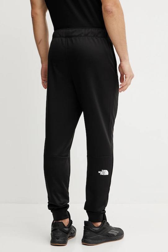 Îmbrăcăminte The North Face pantaloni de trening Reaxion NF0A8CNQJK31 negru