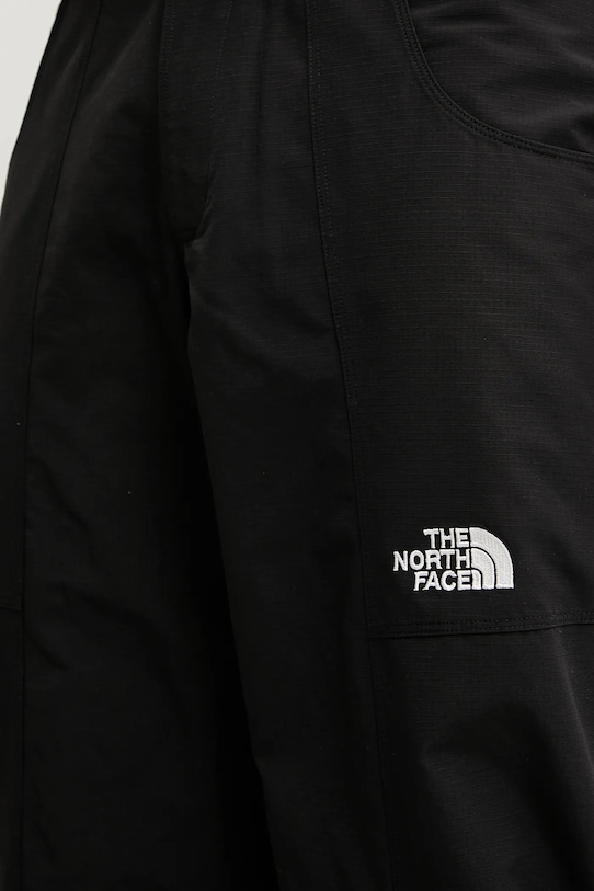 The North Face spodnie TNF X NSE czarny NF0A8BJNJK31