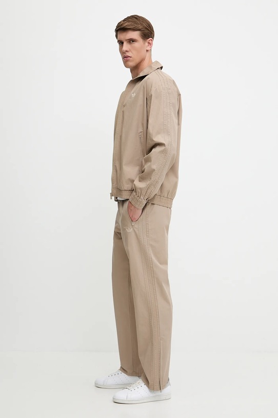 Bavlněné kalhoty adidas Originals Firebird Pants béžová KC0689