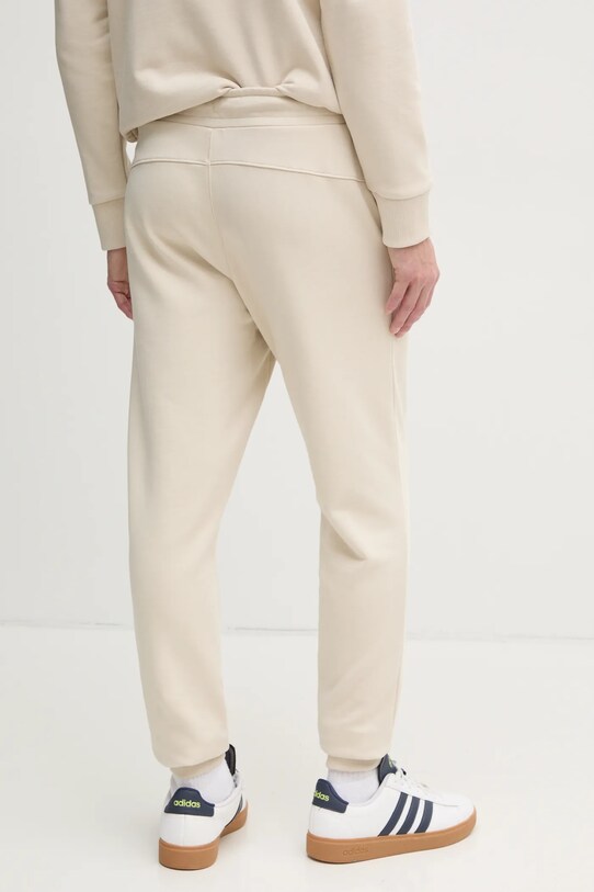 Одяг Бавовняні спортивні штани Calvin Klein K10K114254 бежевий