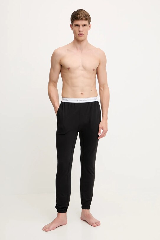 Pyžamové nohavice Calvin Klein Underwear 000NM2851E čierna SS25