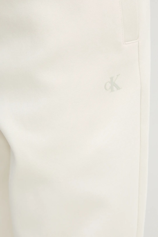 Calvin Klein Jeans spodnie dresowe beżowy J30J327241