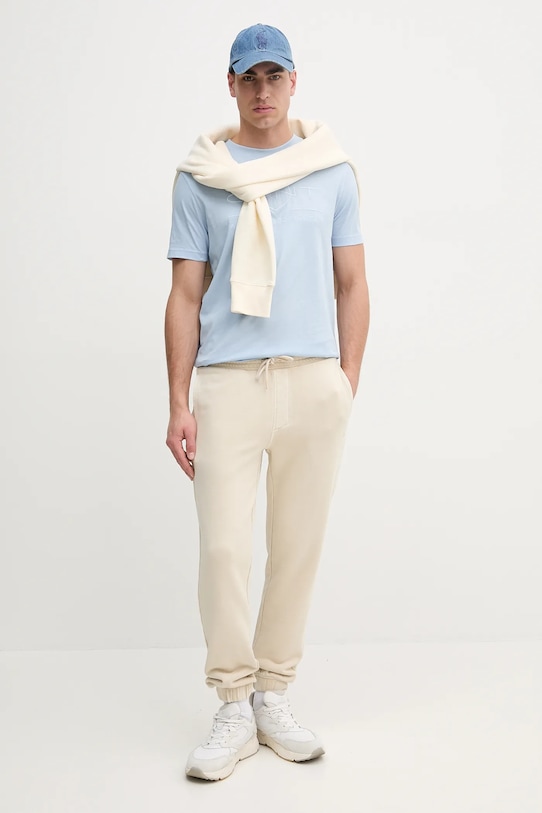 Calvin Klein Jeans spodnie dresowe bawełniane J30J327252 beżowy SS25