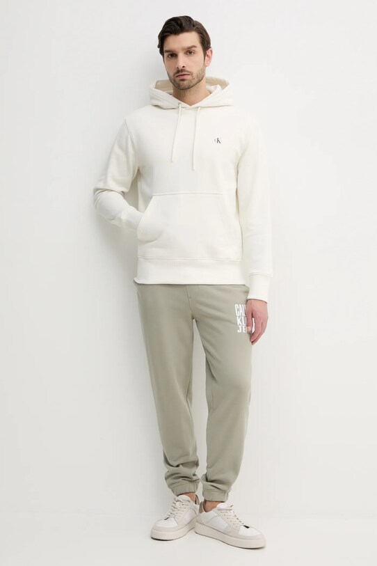 Bavlněné tepláky Calvin Klein Jeans J30J327535 béžová SS25
