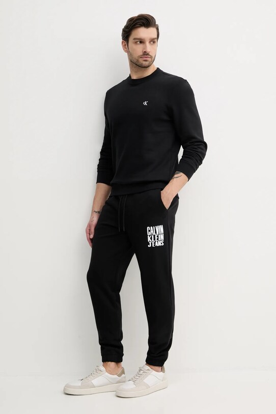 Bavlněné tepláky Calvin Klein Jeans J30J327535 černá SS25