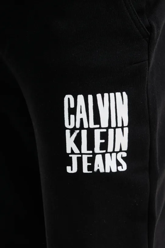 Pamučni donji dio trenirke Calvin Klein Jeans crna J30J327535