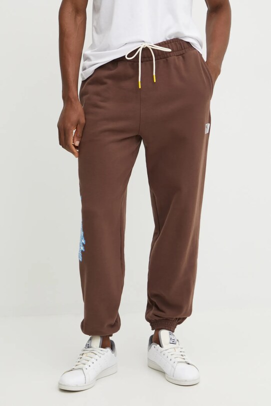 Хлопковые спортивные штаны Puma коричневый 630295