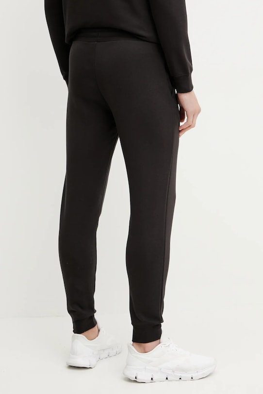 Odzież Puma spodnie dresowe 684652 czarny