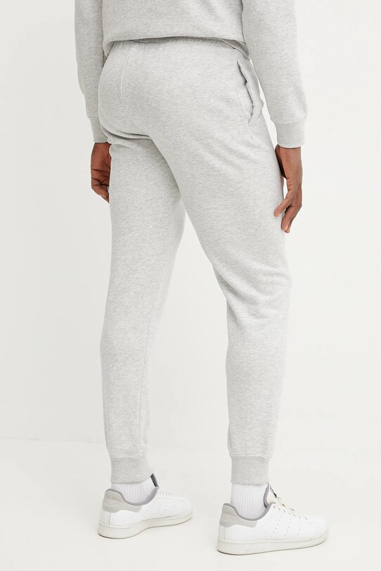 Odzież Puma spodnie dresowe 684666 szary