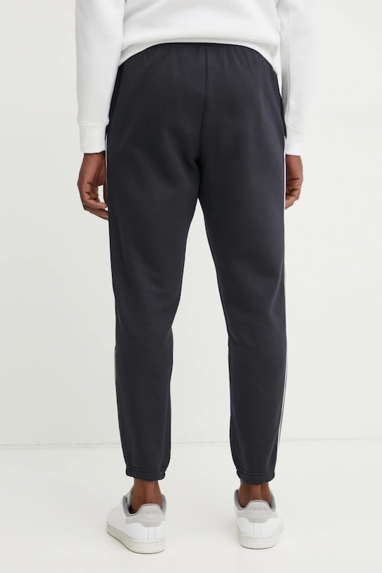 Odzież Under Armour spodnie dresowe Project Rock 1389917 czarny