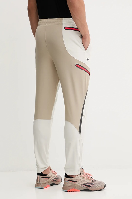 Odzież Under Armour spodnie dresowe Unstoppable 1390256 szary