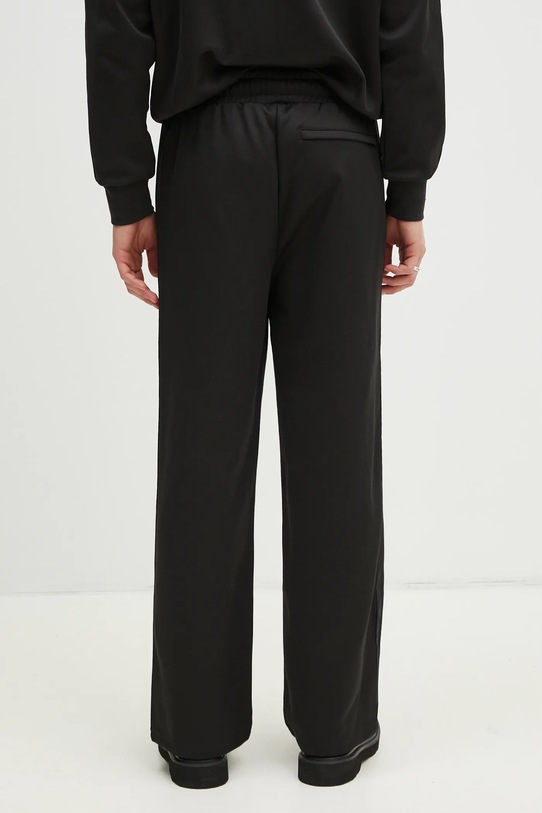 Odzież Puma spodnie dresowe T7 Track Jacket 629938 czarny