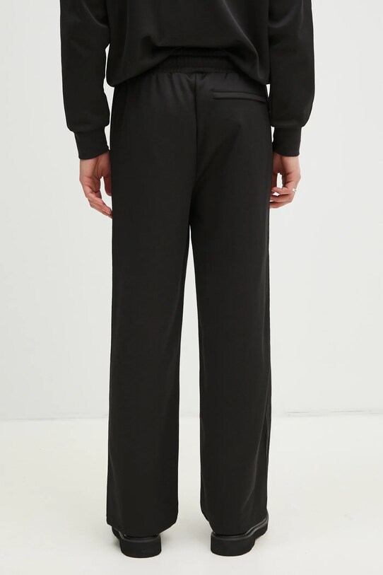 Abbigliamento Puma pantaloni della tuta T7 Track Jacket 629938 nero