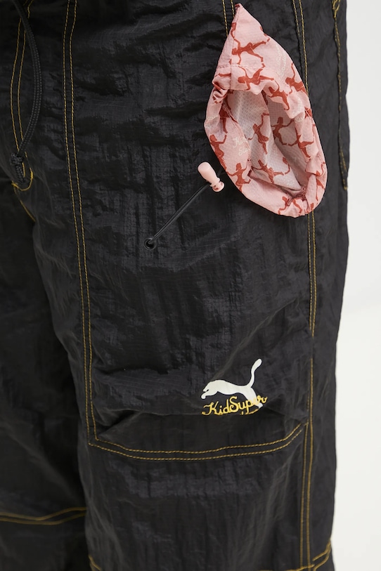 Puma spodnie dresowe PUMA x KIDSUPER Pants czarny 629515