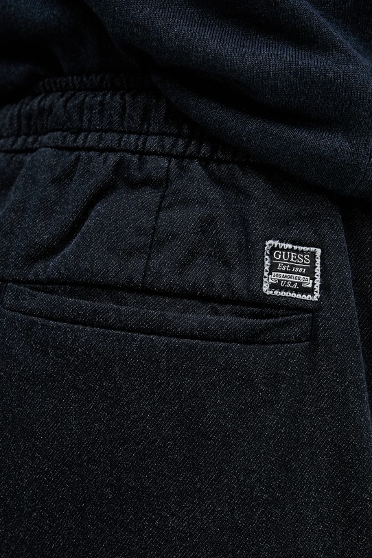 Nohavice Guess tmavomodrá M5RB79.WGXY1