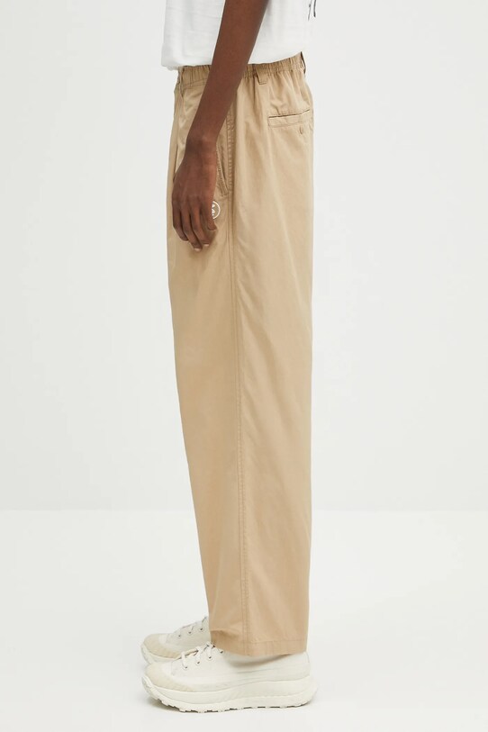 Бавовняні штани AAPE Now Woven AAPPTMB665XXO бежевий SS25