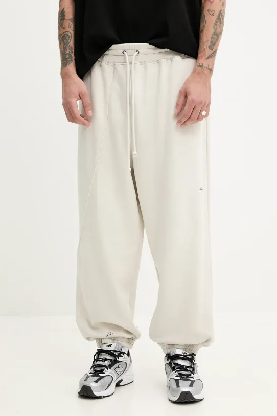 A-COLD-WALL* pantaloni de trening din bumbac uni bej ACWMB291