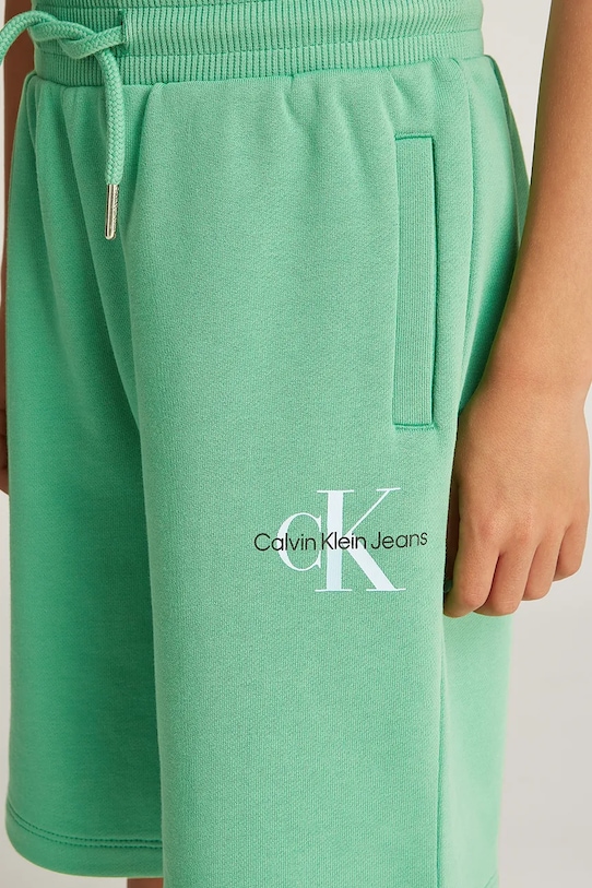 Дитячі бавовняні шорти Calvin Klein Jeans IU0IU00578.128.176.PPYA зелений