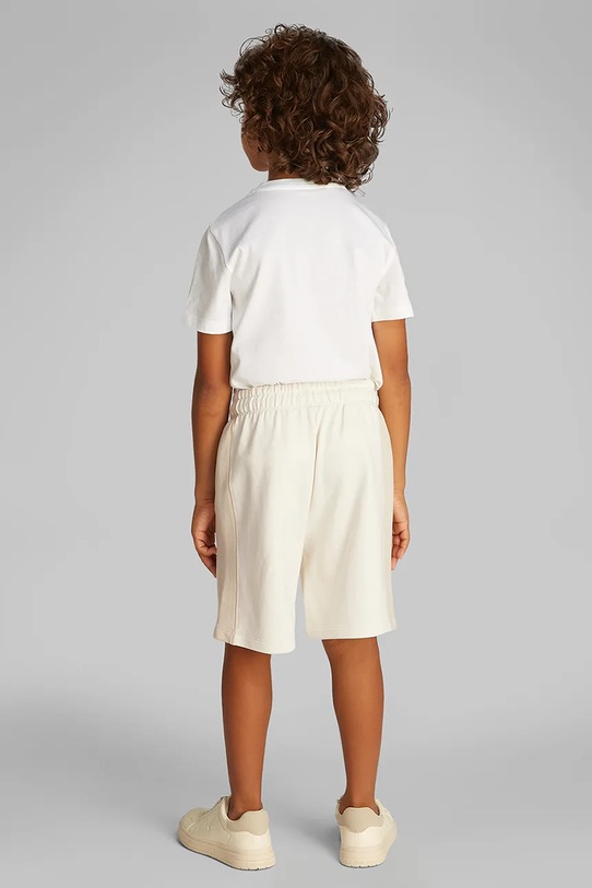 Детские шорты Calvin Klein Jeans бежевый IB0IB02433.128.176.PPYA