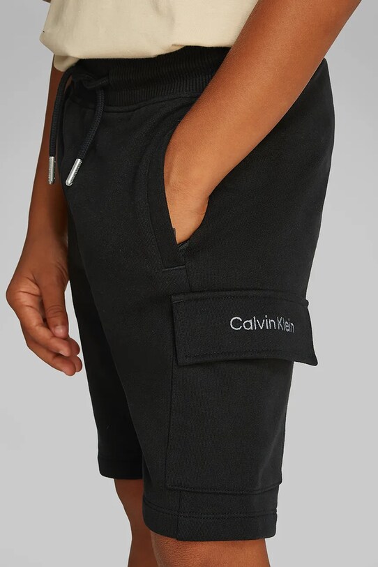 Дитячі бавовняні шорти Calvin Klein Jeans IB0IB02440.PPYA чорний