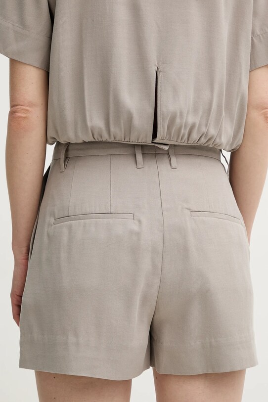 Дрехи Къс панталон Remain 5025901675 бежов