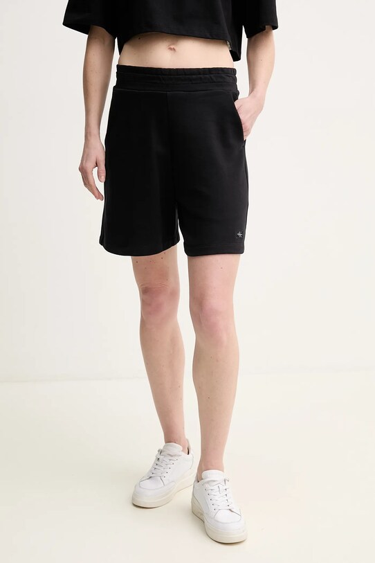 Bavlněné šortky Calvin Klein Jeans medium černá J20J225221