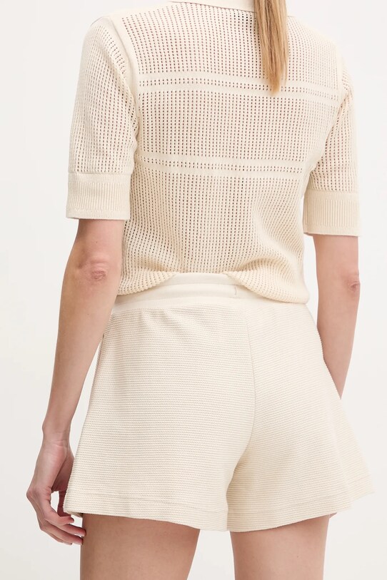 Îmbrăcăminte Puma pantaloni scurti din bumbac 629782 bej